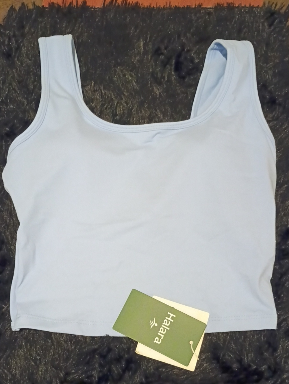 Halara activewear crop top featuring a chic crossover wrap design